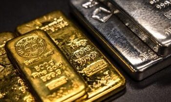 silver-tops-$100-as-gold-nears-$5,000-on-extraordinary-metals-rally